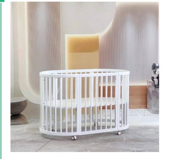 سرير الأطفال البيضاوي المتعدد الاستخدامات (Stokke Sleepi)